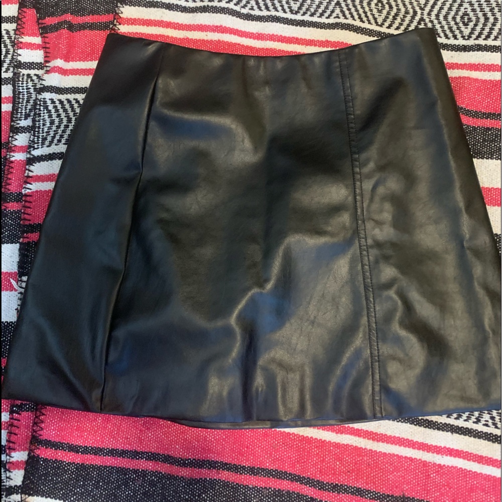 Short black faux leather skirt